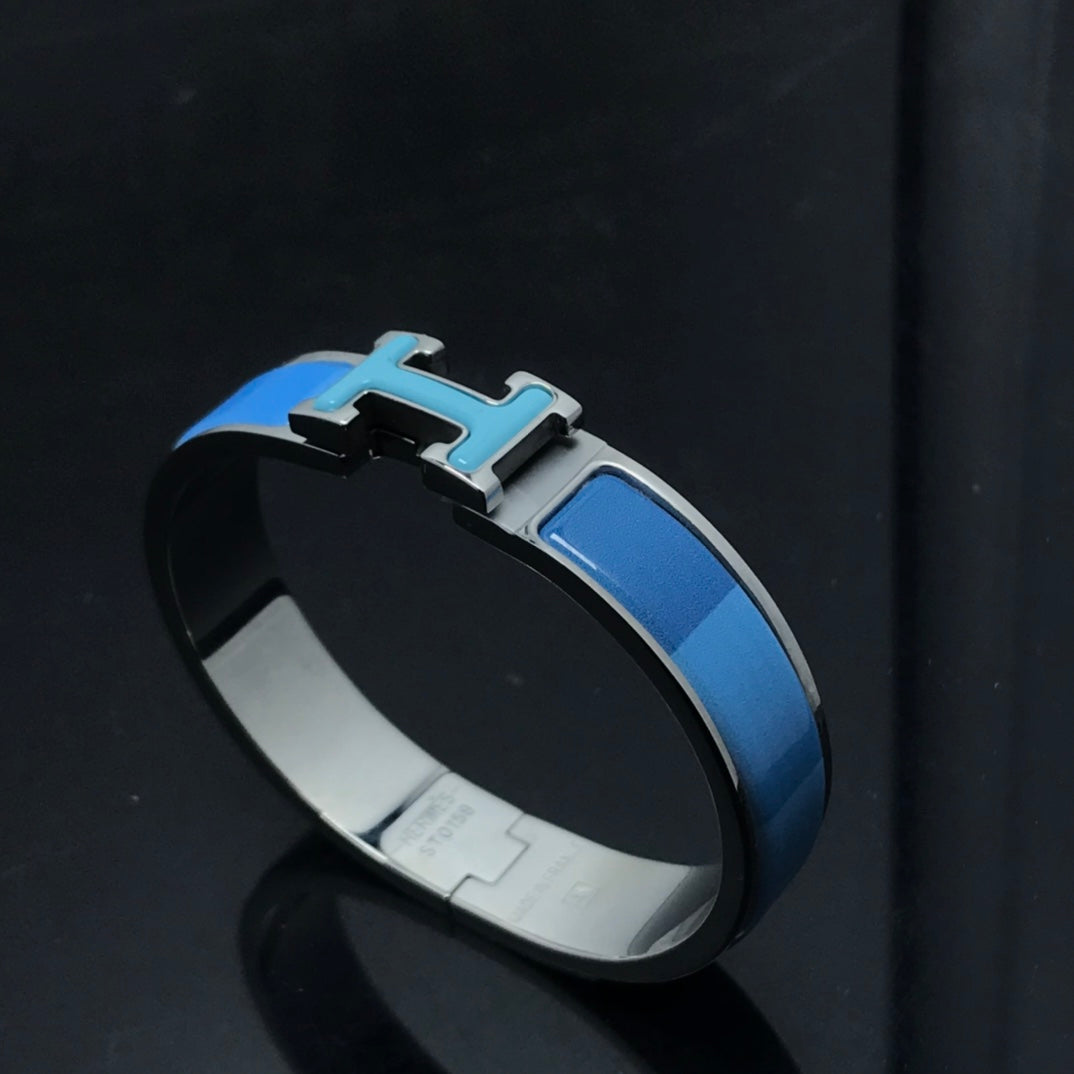 [Cyra] H ARMBAND BLAU REGENBOGEN KERAMIK
