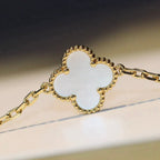[Cyra]  CLOVER 20 MOTIFS WHITE MOP NECKLACE