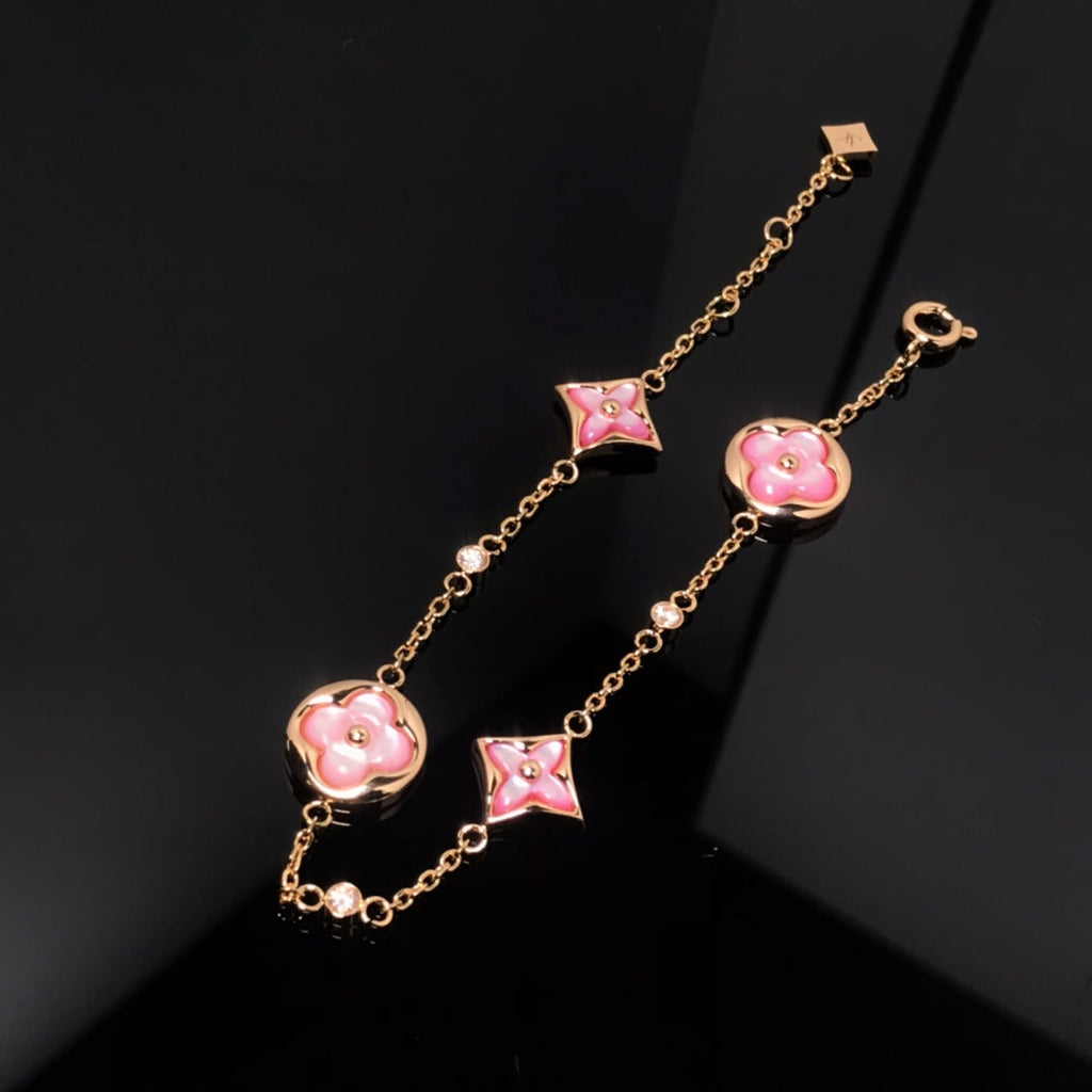 [Cyra] ARMBAND MIT STERN- UND SONNENMOTIV, ROSA PERLMUTT, ROSÉGOLD
