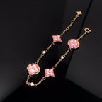 [Cyra] ARMBAND MIT STERN- UND SONNENMOTIV, ROSA PERLMUTT, ROSÉGOLD