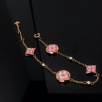 [Cyra] ARMBAND MIT STERN- UND SONNENMOTIV, ROSA PERLMUTT, ROSÉGOLD