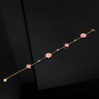 [Cyra] ARMBAND MIT STERN- UND SONNENMOTIV, ROSA PERLMUTT, ROSÉGOLD