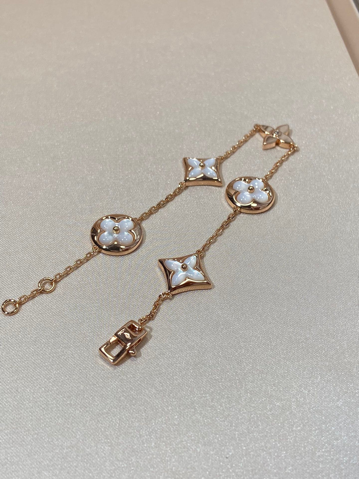 [Cyra]  STAR AND SUN 5 MOTIF MOP PINK GOLD BRACELET