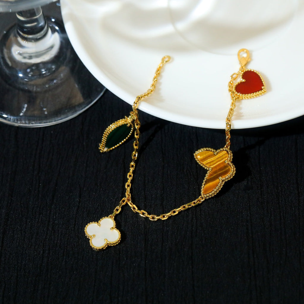 [Cyra] LUCKY SPRING 5-MOTIV-ARMBAND IN GOLD