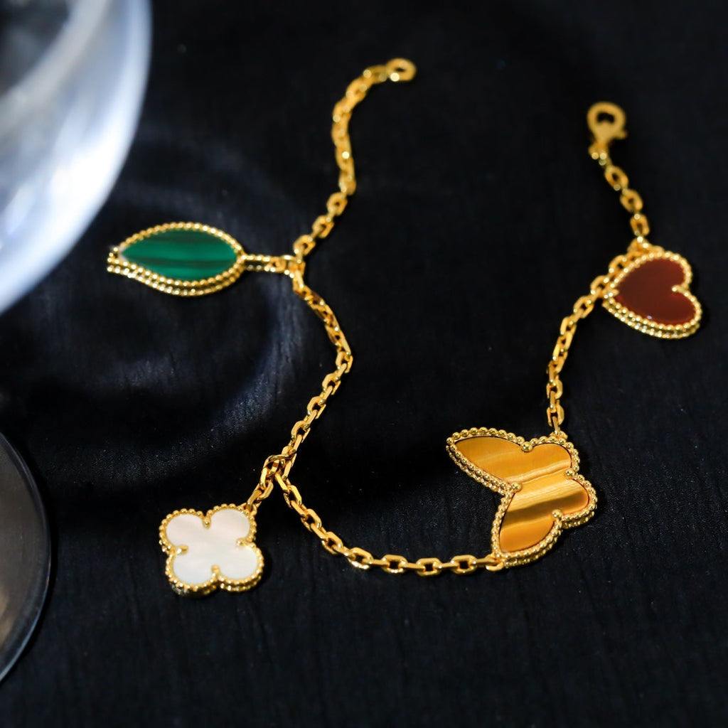 [Cyra] LUCKY SPRING 5-MOTIV-ARMBAND IN GOLD