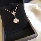 [Cyra]  STAR AND SUN WHITE MOP 2 MOTIF PINK GOLD NECKLACE