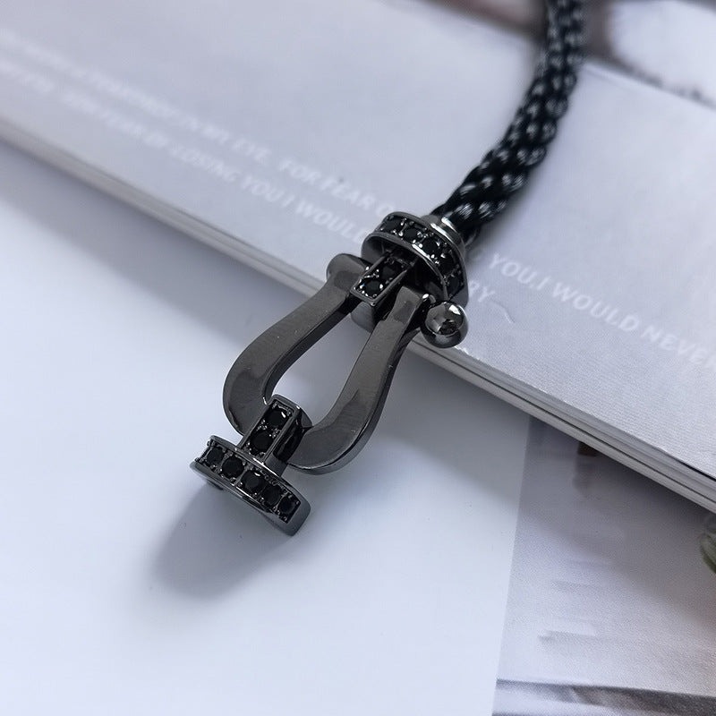 {
  "Cyra": "FORCE LARGE SERIES HORSESHOE BLACK SAMURAI BRACELET"
}