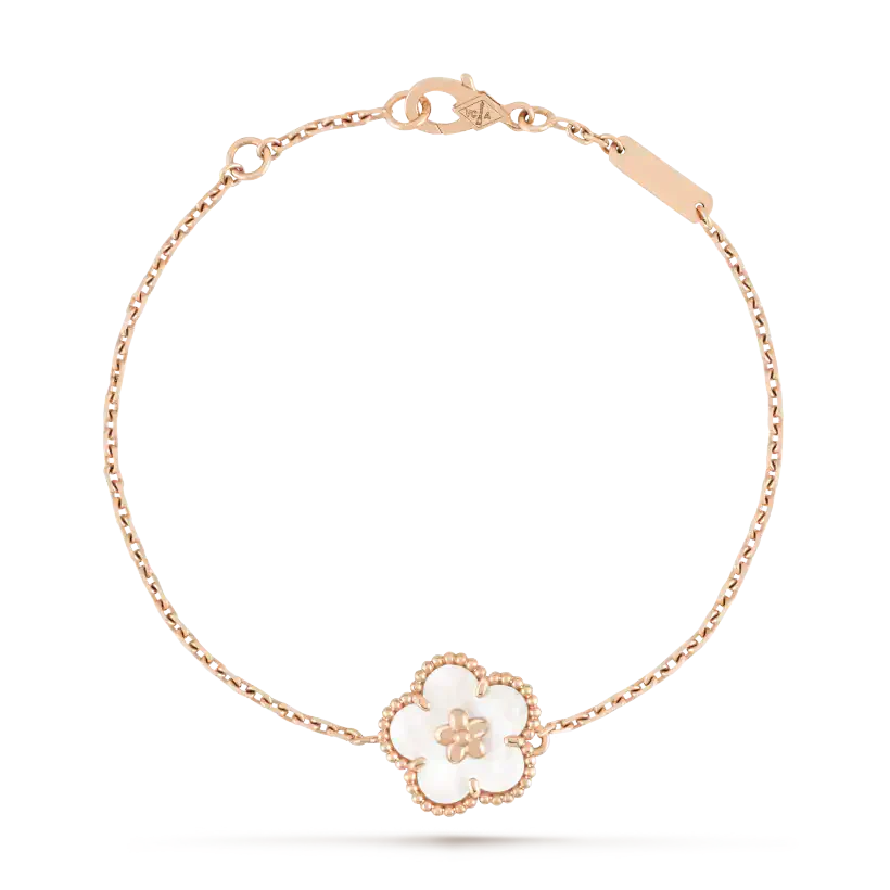 [Cyra] ARMBAND MIT GLÜCKSBRINGER AUS WEISSEM PERLMUTT UND PFLAUMENBLÜTE